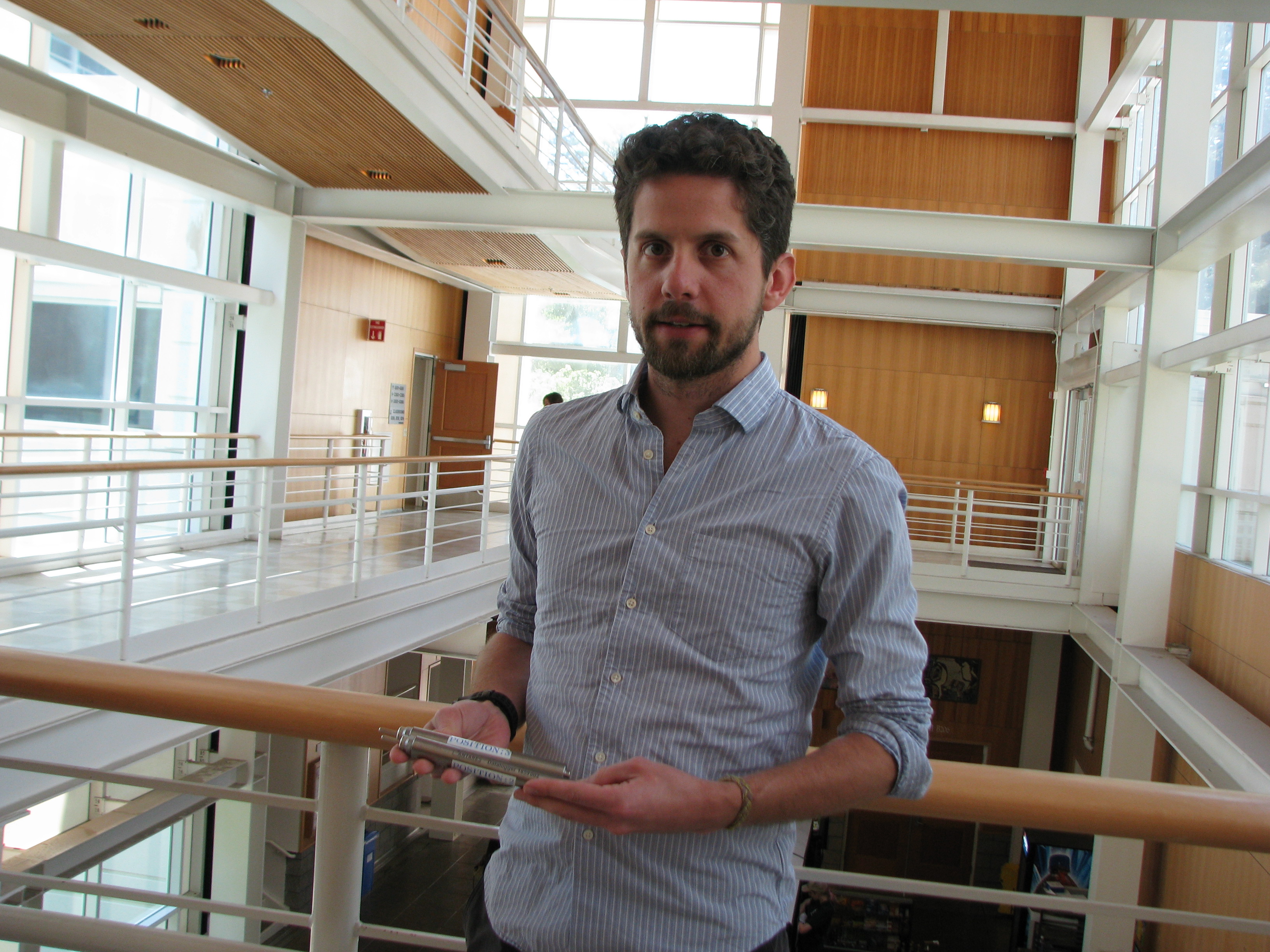 Patrick Fulton, a geology post-doc at the University of California, Santa Cruz, holds temperature sensors retrieved from an earthquake fault more than seven kilometers under water to learn more about the devastating March 2011 Japan quake and tsunami. Photo by Paul Gabrielsen.