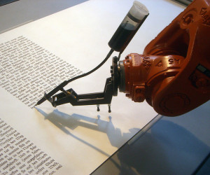 A writing robot. Lacks personality. Credit: Mirko Tobias Schaefer, http://www.flickr.com/photos/gastev/2174504149/