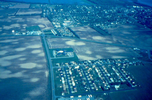 Sandblows (lighter circles) from past seismic activity still dot fields near New Madrid, Missouri. Image provided courtesy of David Rogers and David Stewart.